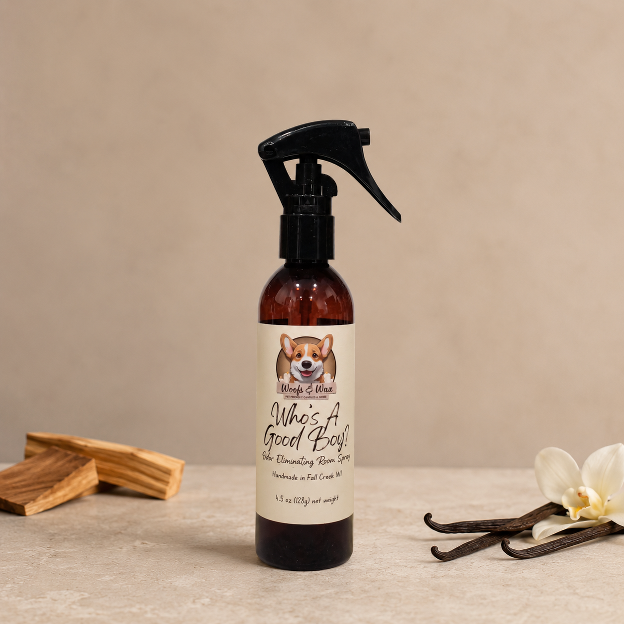 Room spray bottle with a label on a neutral background with sandalwood and vanilla.