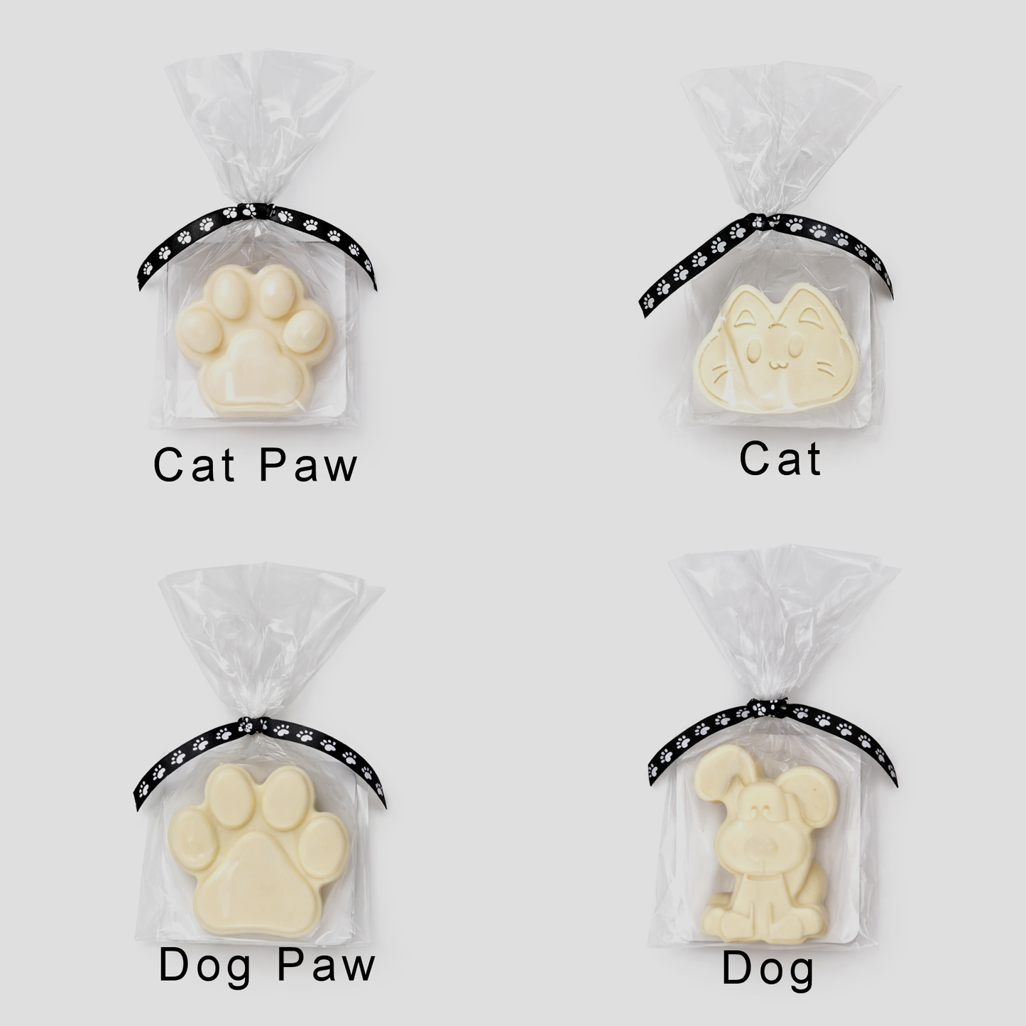 Four clear bags with shampoo bars labeled 'Cat Paw', 'Cat', 'Dog Paw', and 'Dog' on a white background.