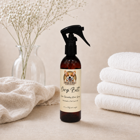 Bottle of 'Corgi Butt' spray with a dog illustration on a neutral background.