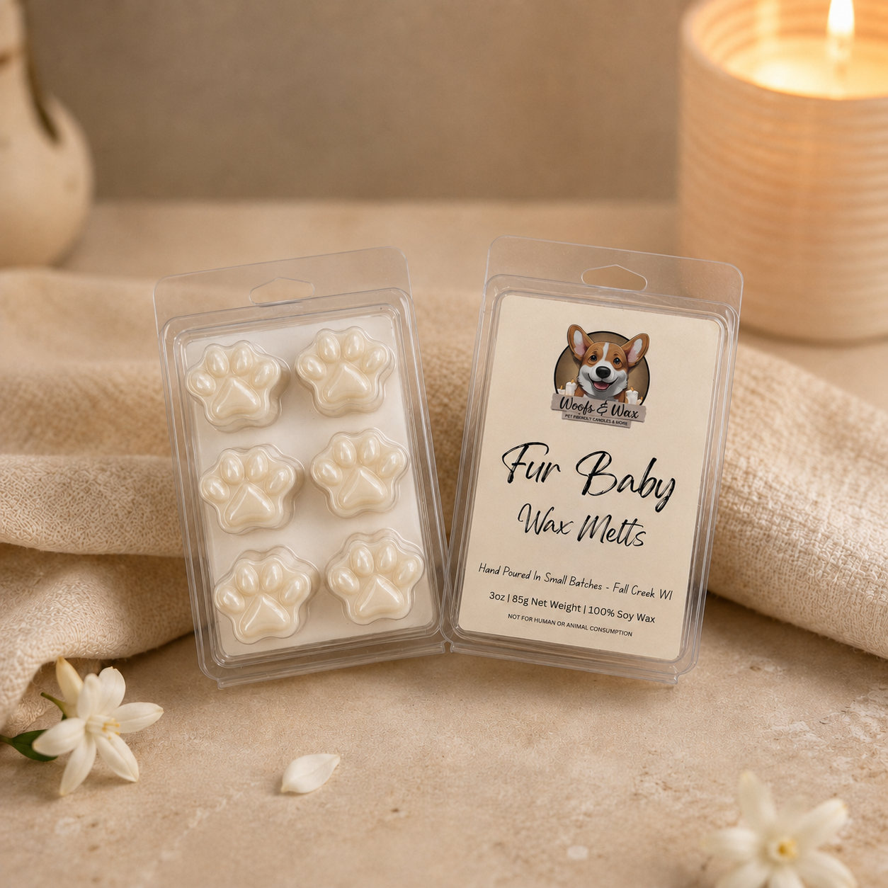 Wax melts with the label "Fur Baby" and image of a dog on a counter with a towel and candle.