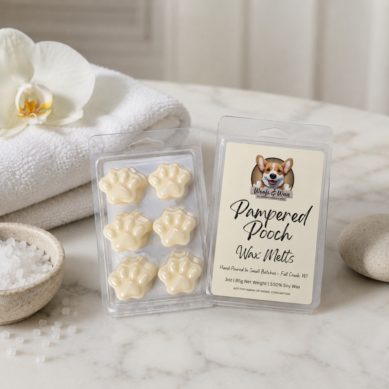Pampered Pooch wax melts packaging with a towel and orchid in the background